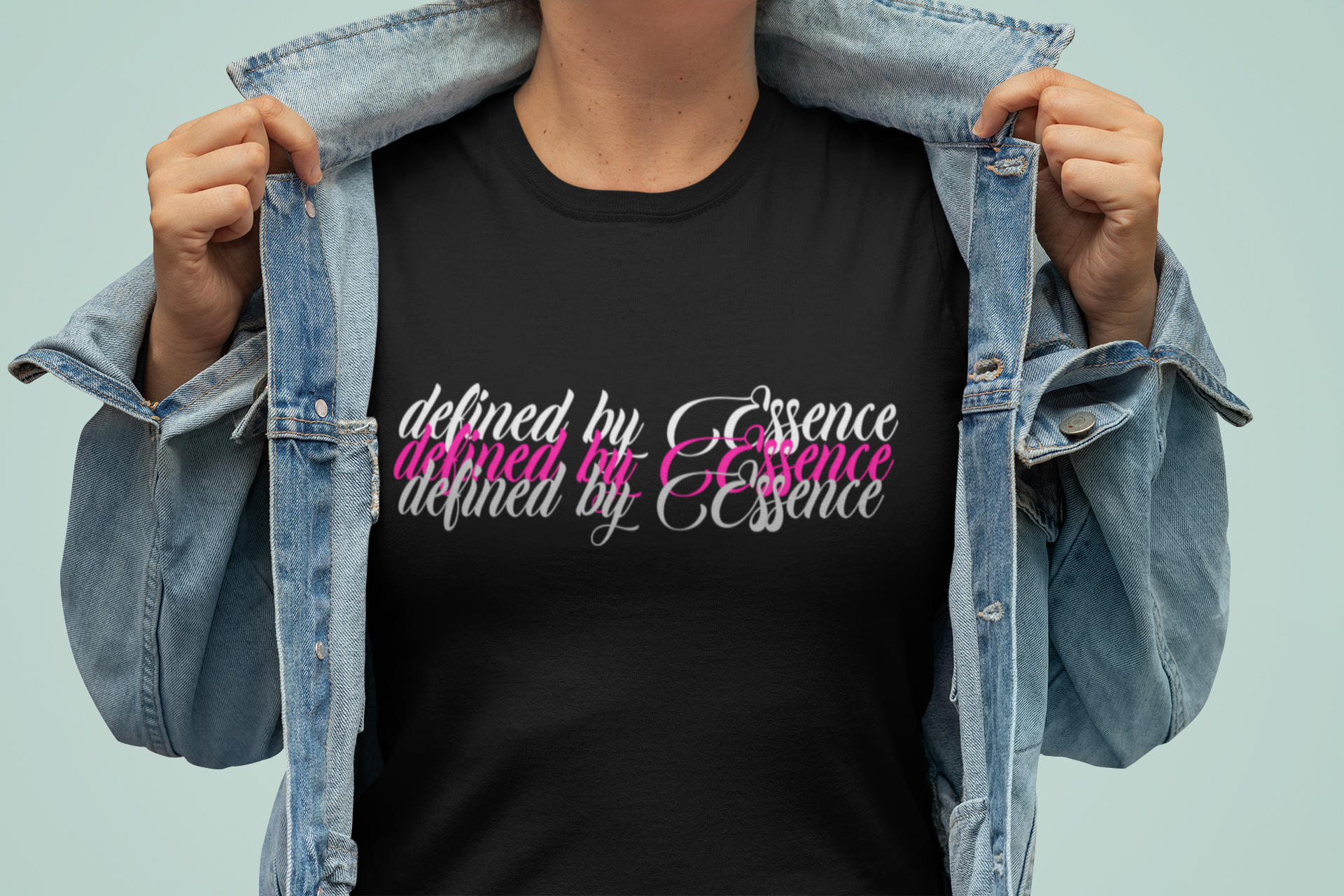 Women wearing black 3d Defined By Essence T- Shirt with multilayering wording with her collared popped.