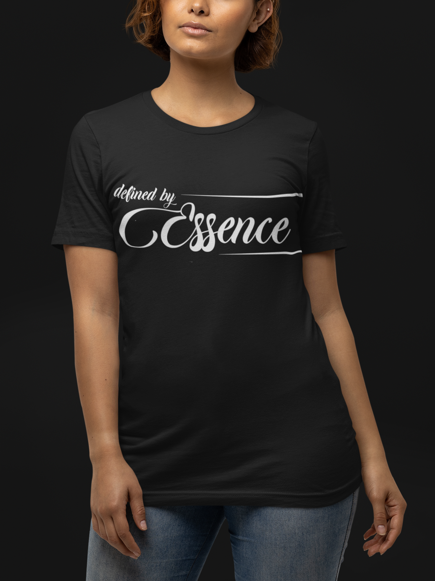 Women wearing a black infinite classic Defined By Essence T-Shirt with white writing, modeling with short hair